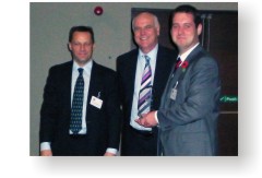 Jim Brightman receiving his award from Andy Topley and Clive Waddington