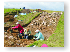 Volunteers excavating the rampart of the hillfort