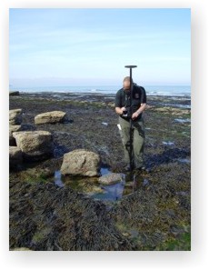 Recording rock cut features on the foreshore at Hummersea Alum works, Redcar and Cleveland