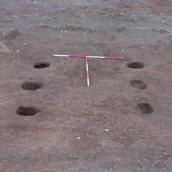 A six-posthole granary building associated with one of the Bronze Age roundhouses. © Copyright ARS Ltd 2018