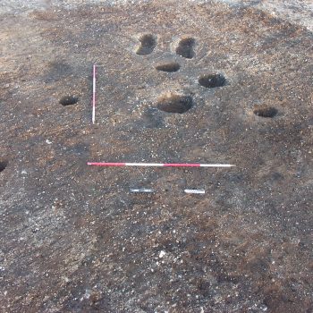 A triangular-shaped structure consisting of postholes, pits and a hearth that contained Early Neolithic pottery. © Copyright ARS Ltd 2018