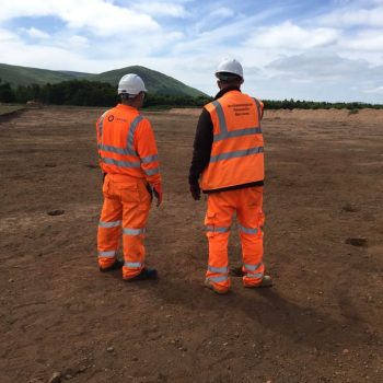 Rupert, our Projects Officer, explains to the quarry manager about what we've found.