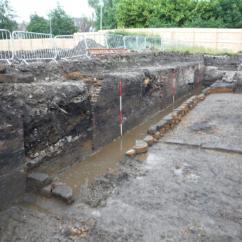 We found a sump that had been dug to counteract rising water levels and a flood defense that had been constructed using disused grinding stones. © Copyright ARS Ltd 2018