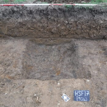 An excavated section through the ring ditch (scale = 2m). © Copyright ARS Ltd
