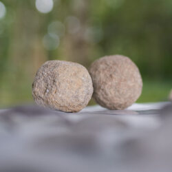 The two ballista balls which have been recovered. These would have been fired from a catapult. © Copyright Sam Devito