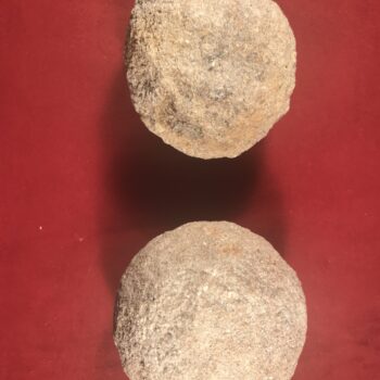 A pair of ballista balls discovered during the excavation © Copyright ARS Ltd 2022