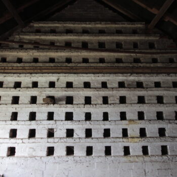 View of the dovecote in the first floor of one of the barns added in the 1840s © Copyright ARS Ltd 2022