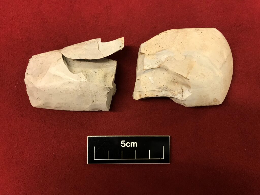 Fragments of the Neolithic flint axehead found in two separate pits © Copyright ARS Ltd 2023