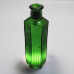 For today's (rather chilly) #FindsFriday we've this green medicine bottle with its art-deco overtones, which was used in the sale of camphor oil. Extracted from the wood of camphor trees and processed by steam distillation, this oil has traditionally been used topically to relieve pain, irritation, and itching, as well as chest congestion and inflammatory conditions. Camphor oil is easily absorbed through the skin when applied and is known for its strong taste and odour, so it should be no surprise to learn it was employed as a fumigant during the Black Death in the 14th century AD! It is a long-coveted oil and has been considered a valuable ingredient in both perfume and embalming fluid over the years. © Copyright ARS Ltd 2023
