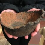 For the first #FindsFriday of the year we have a base of a Roman jar dating to the late 1st - 3rd century AD! Harrold shell-tempered ware is relatively well distributed across southern Britain and is distinguished by its slightly ‘soapy’ fabric and frequent shell inclusions. Although irregular in texture, this type of pot would have been wheel-thrown. © Copyright ARS Ltd 2023