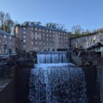 For this week’s #BuildingKnowledge we are showcasing our work on the Grade I Listed Cromford Mills, which we are delighted to hear has recently received planning approval. Archaeological Research Services Ltd had recently been commissioned to produce a Heritage Statement to assist a proposed development at Cromford Mills, which represents a core component of the UNESCO Derwent Valley Mills World Heritage Site. Our work focused upon the surviving structural remains and wheel pit of the second mill, with the exciting proposed development aiming to utilise the existing watercourse and wheel pit to generate renewable energy and enhance the site’s visitor interpretation. © ARS Ltd 2022