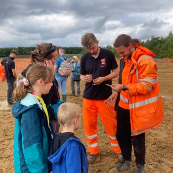 The team engaging and helping identify finds © Copyright ARS Ltd 2023