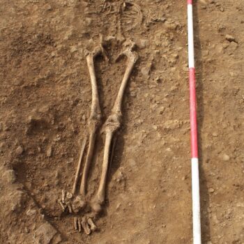 Burial of an adolescent in a grave 1 looking NW © ARS Ltd 2023
