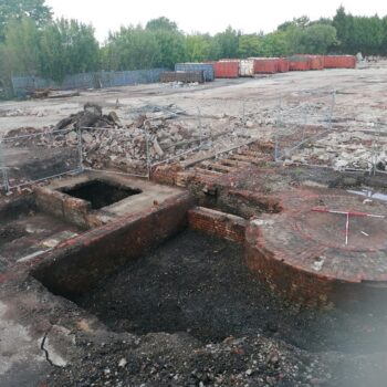 Chimney foundation in Area 2 with flue leading off to left © ARS Ltd 2023