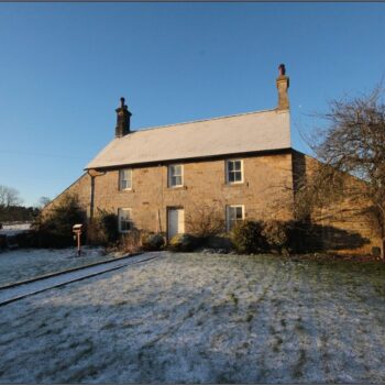 The mid-late 18th century two-storey two-unit farmhouse at Rugley Walls Farm © ARS Ltd 2023