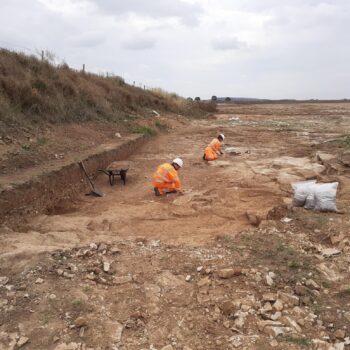 Working shot, looking south-east over part of a Roman quarry pit during excavation © ARS Ltd 2024