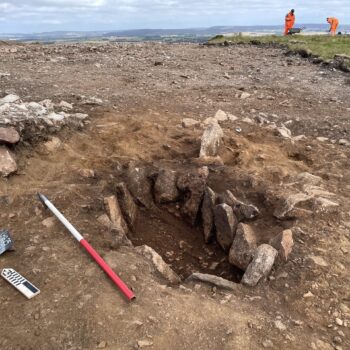 Stone-lined cist discovered within a small earlier cairn that pre-dates the ring cairn © ARS Ltd 2025