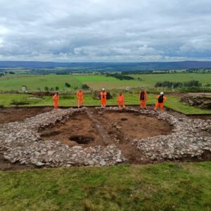 The excavated ring cairn looking south towards the Simonside Hills © ARS Ltd 2025
