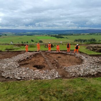 The excavated ring cairn looking south towards the Simonside Hills © ARS Ltd 2025
