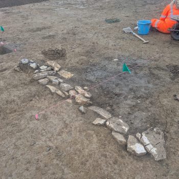 Stone feature at Site 1 that proved to be part of a Romano-British corn dryer © ARS Ltd 2025