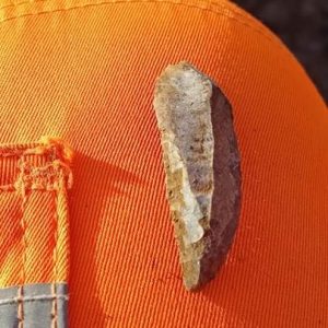 A retouched flint blade of likely Mesolithic date © ARS Ltd 2025